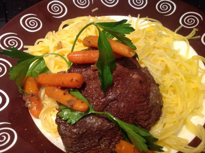 Говядина, тушенная с морковью